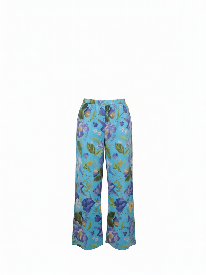 Pantalón largo lino azul claro estampado floral de B&J, vista frontal.