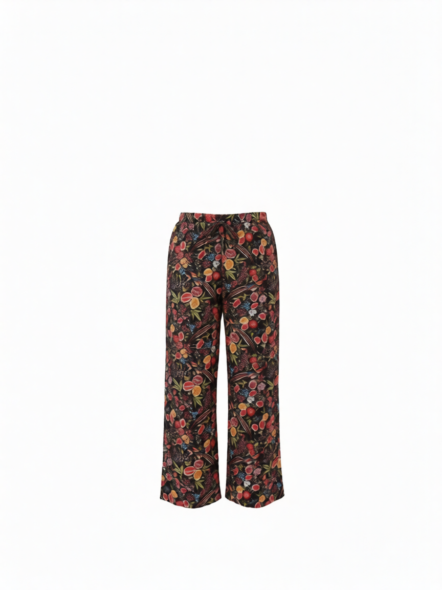 Pantalón largo poliéster negro estampado floral de B&J, vista frontal.