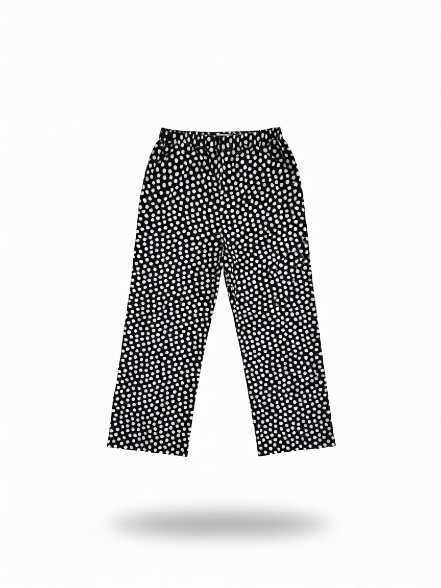 Pantalón largo lino negro estampado lunares de B&J, vista frontal.